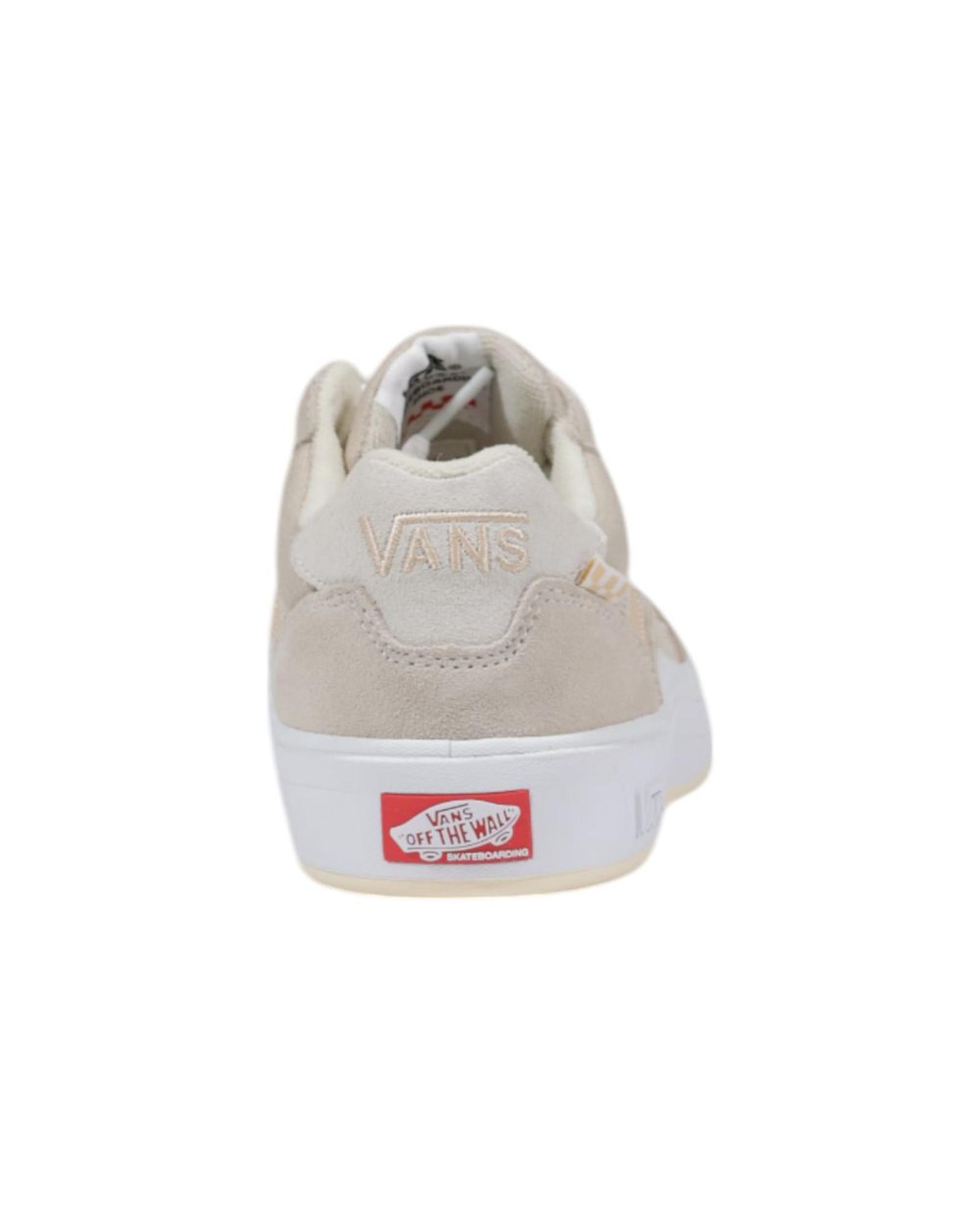 Beige Vans sneaker rear view with logo displayed.