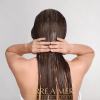 12pc set terre a mer pure hydration amino acid/argan oil shampoo & conditioner 60ml travel size Woman applying hair treatment product, rear view.