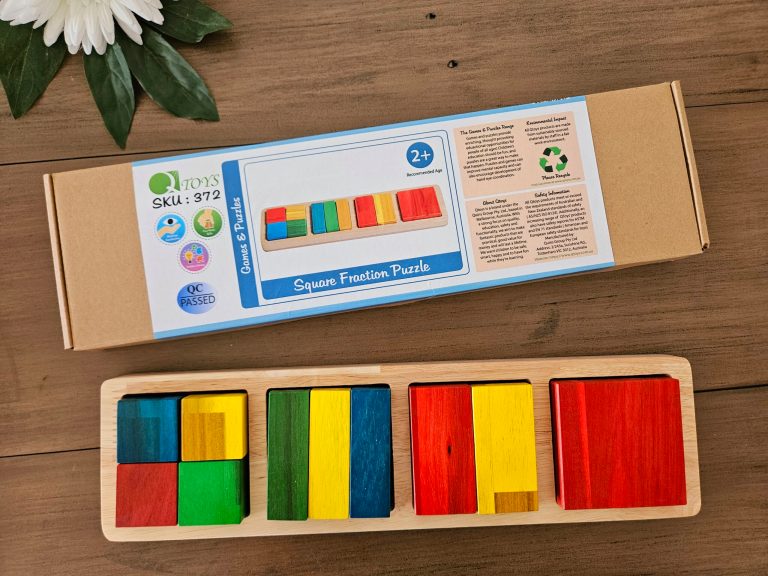 Colourful wooden fraction puzzle with packaging box.
