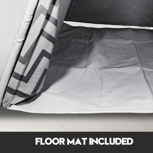 Grey floor mat inside tent, chevron pattern.