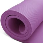 Purple yoga mat rolled up