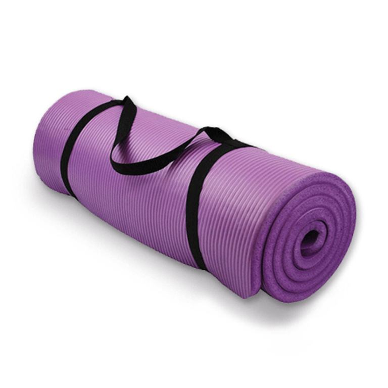 Purple yoga mat with carry straps.