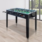 Foosball table in bright room with window view.