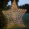 Glowing star-shaped outdoor fairy lights at dusk.