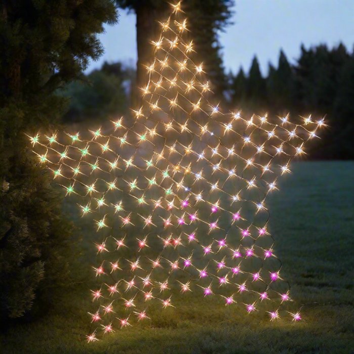 Glowing star-shaped outdoor fairy lights at dusk.
