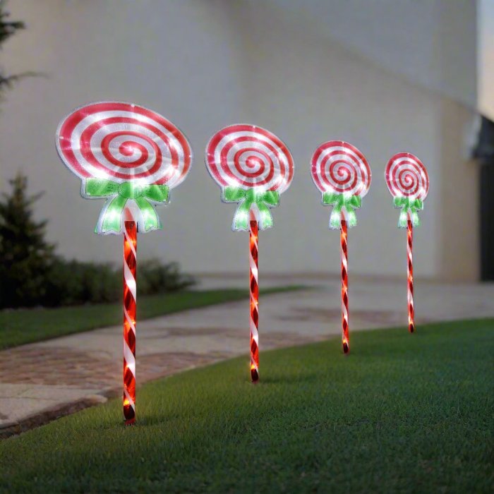 Candy cane garden lights at dusk