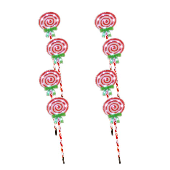 Red and white candy cane spiral lollipops.