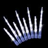 LED icicle Christmas lights on black background.