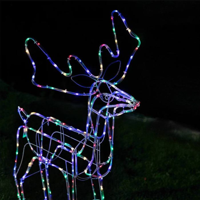 led twinkling standing reindeer – 110cm available in 2 colors cool white Colourful reindeer lights decorate the garden at night.
