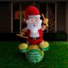 Inflatable Santa playing drums, 'Happy Rocking Holidays'.
