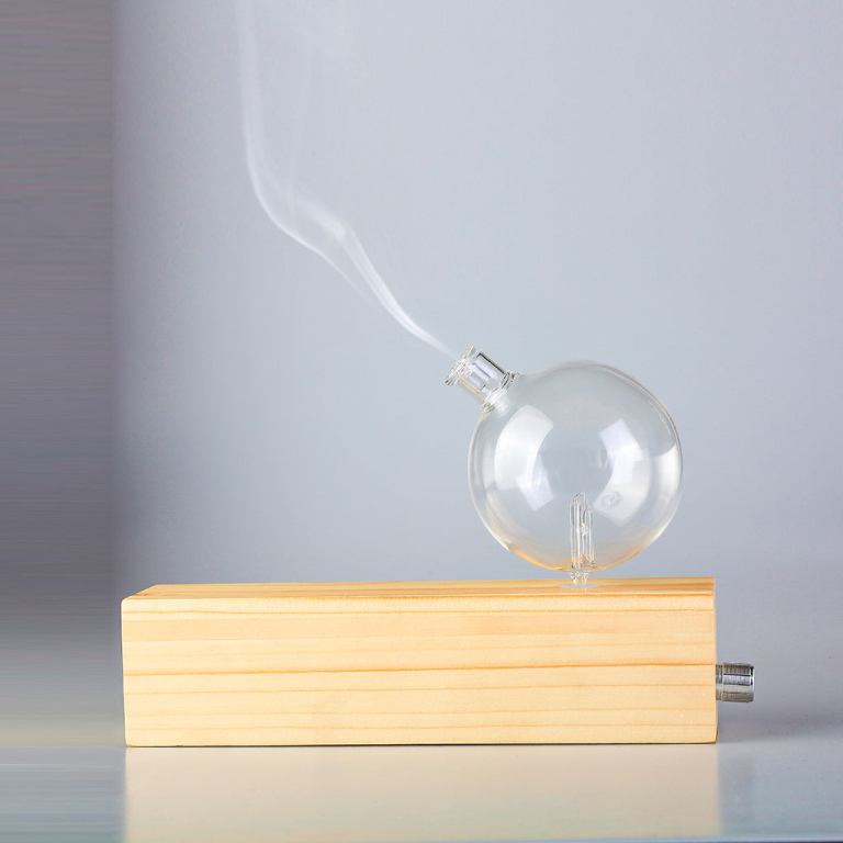 Wooden base glass oil burner with smoke