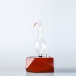 v760 n 22db 195285 00.jpg Elegant glass diffuser with wooden base.