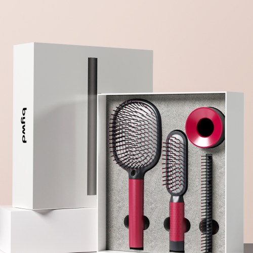 Stylish hairbrush set in elegant packaging.