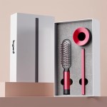Red hairbrush and accessories in open box
