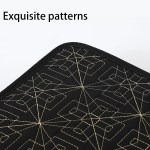 Intricate geometric patterns on dark fabric.