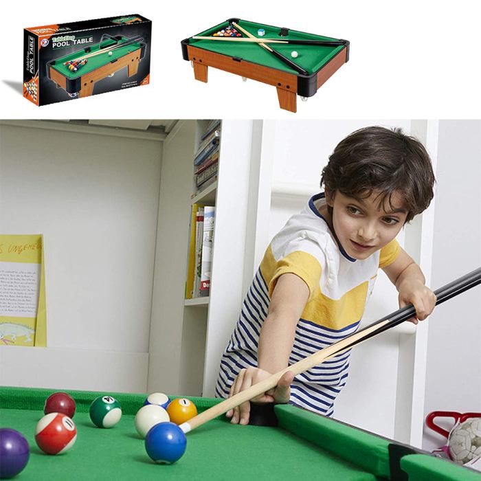 wooden mini snooker tables billiards game pool table set toy extra size for kids Child playing on small pool table at home.
