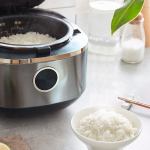 joyoung mini rice cooker 2l for 1 3 people led touch panel fa f20 au model Rice cooker steaming rice beside filled bowl