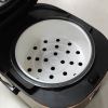 Black rice cooker with white inner pot