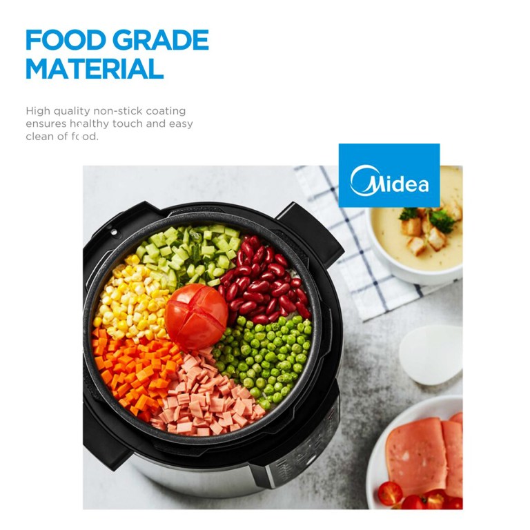 Electric cooker with colourful chopped vegetables.