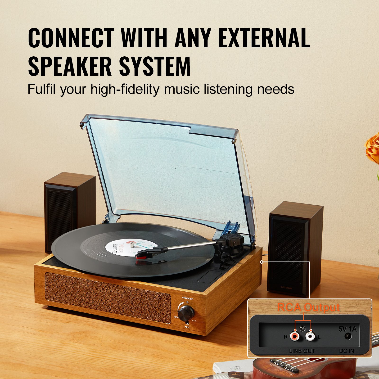 Record player connecting to external speakers via RCA output.