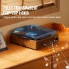 Turntable with transparent flip-top hood on wooden table.