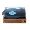 Vintage turntable playing a vinyl record.