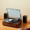 Vintage record player with vinyl and speakers.