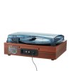 Vintage turntable with wooden base and vinyl record.