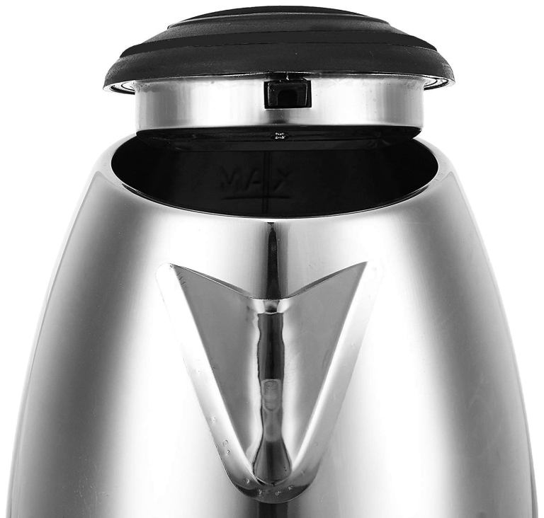 Open stainless steel kettle with lid partially on.