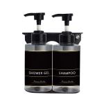v959 dsdr0149 202507050145 00.jpg Shower gel and shampoo bottles, black labels.