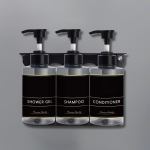 liquid soap dispenser 300ml x 3 transparent Black shower gel, shampoo, conditioner bottles on rack.