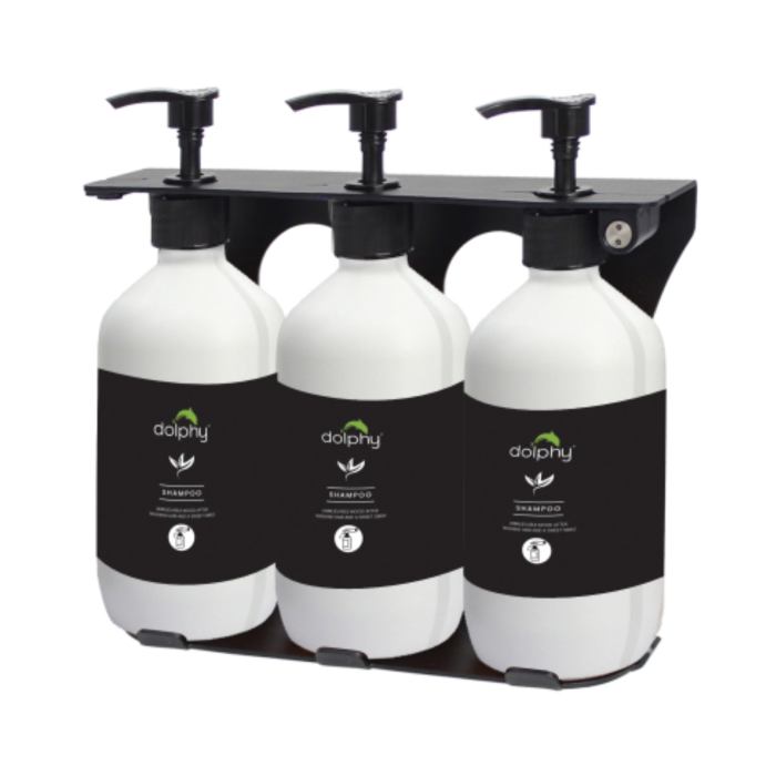 Three bottle shampoo dispenser with pump tops.