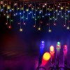 Colourful hanging fairy lights at night.