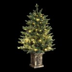jingle jollys christmas tree 1.2m led potted xmas tree party decor 8 light modes Illuminated potted Christmas tree against black background.