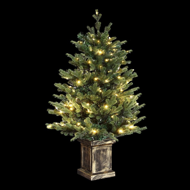 jingle jollys christmas tree 1.2m led potted xmas tree party decor 8 light modes Illuminated potted Christmas tree against black background.