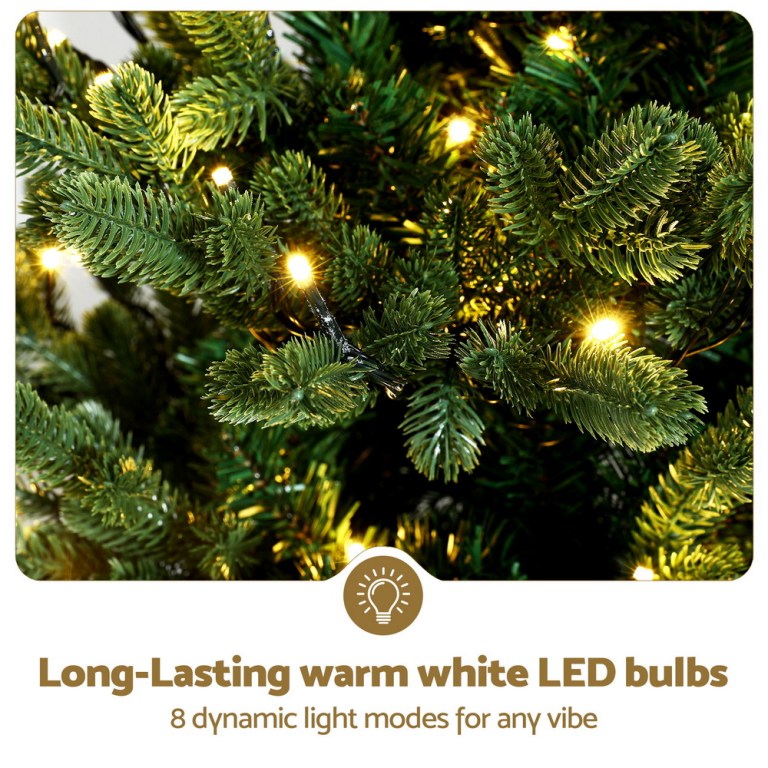 jingle jollys christmas tree 1.2m led potted xmas tree party decor 8 light modes Christmas tree with warm white LED lights glowing.
