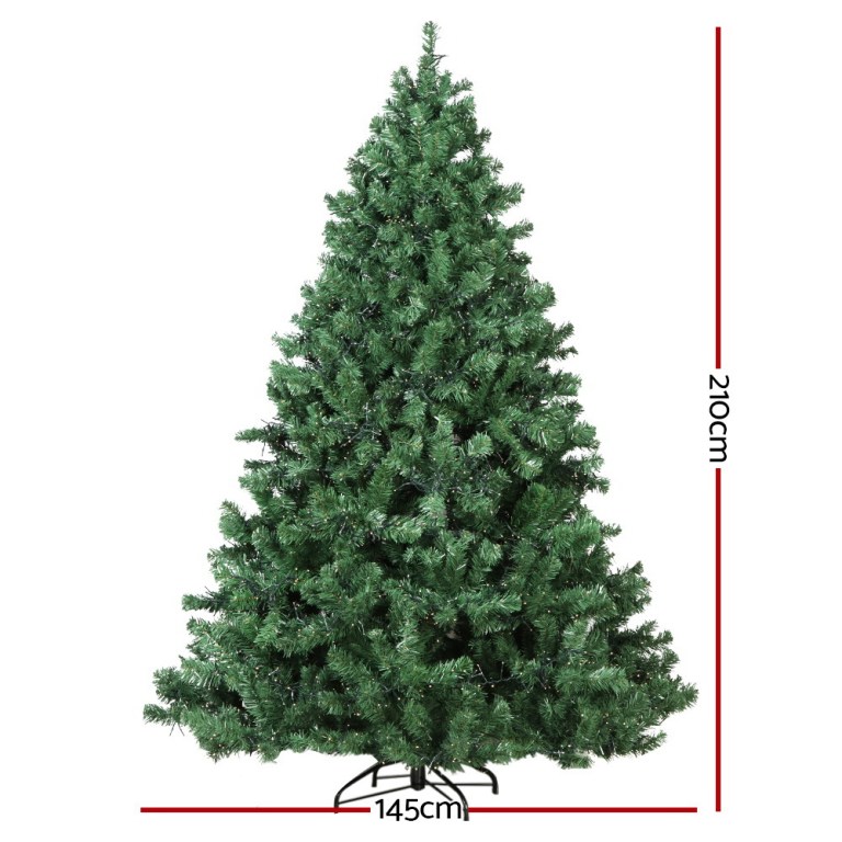 Artificial Christmas tree, 210cm tall, 145cm wide.