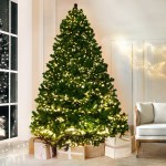 Lit Christmas tree with presents, cosy room
