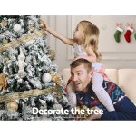 jingle jollys christmas tree 2.4m xmas tree decorations snow flocked 1500 tips Father and daughter decorating Christmas tree together.