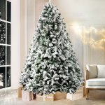 jingle jollys christmas tree 2.4m xmas tree decorations snow flocked 1500 tips Frosted Christmas tree with presents in living room.