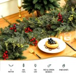 jingle jollys 3m christmas garland pre lit led with pine cones xmas decor green Christmas table setting with candle and festive greenery.