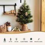 jingle jollys christmas tree 60cm mini tabletop 8 light modes timer xmas tree 60cm decorated Christmas tree with lights on table.