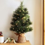 jingle jollys christmas tree 60cm mini tabletop 8 light modes timer xmas tree Small Christmas tree with lights and gift box.