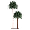 Artificial palm trees on white background