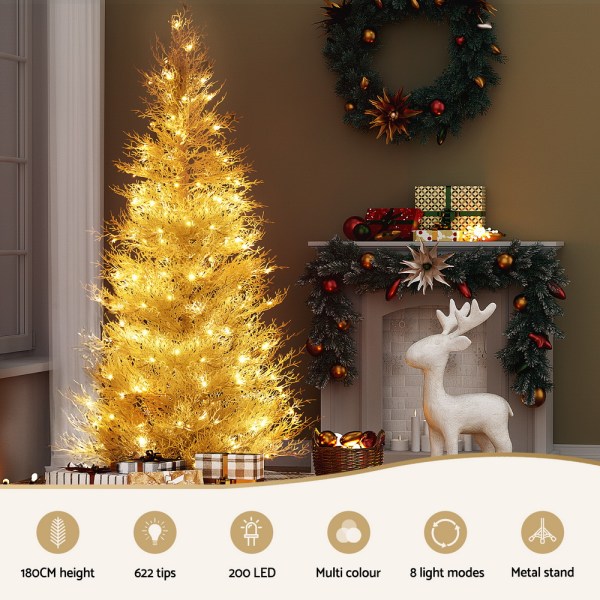 jingle jollys 1.8m led christmas tree 8 modes adjustable multi color light snowy Stylish Christmas decor featuring lit golden tree and gifts.