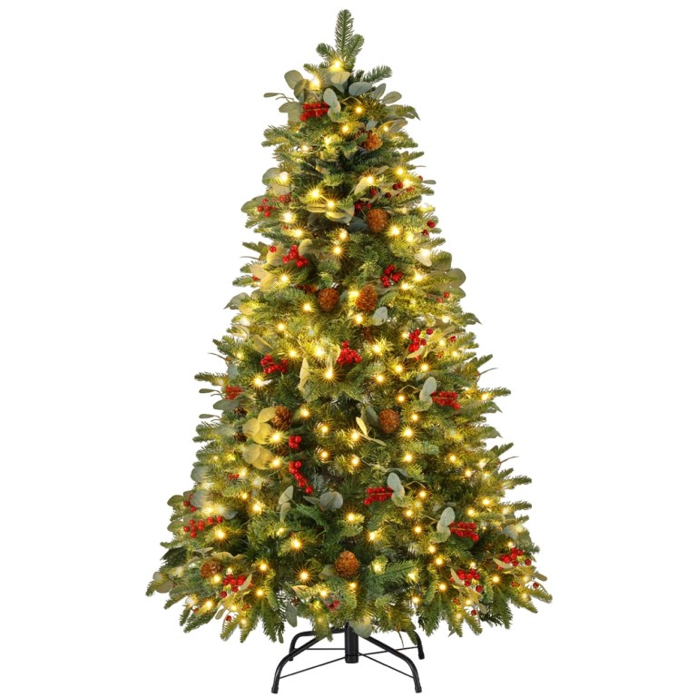xm tr well 5ft led 202508061628 00.jpg Decorated Christmas tree with lights and pinecones.