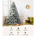 jingle jollys christmas tree 2.1m snow flocked xmas tree decorations 780 tips Snow-frosted Christmas tree with star topper indoors.