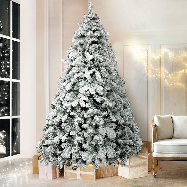 jingle jollys christmas tree 2.1m snow flocked xmas tree decorations 780 tips Snowy Christmas tree in living room with presents.