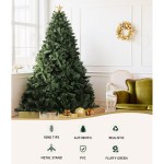 Artificial Christmas tree with star and gold decorations.