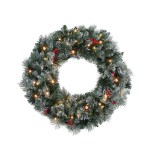 Festive Christmas wreath with lights and red berries.